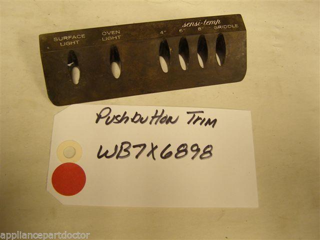 GE OVEN WB7X6898 PUSH BUTTON TRIM USED PART ASSEMBLY GE OVEN WB7X6898 PUSH BUTTON TRIM USED PART ASSEMBLY